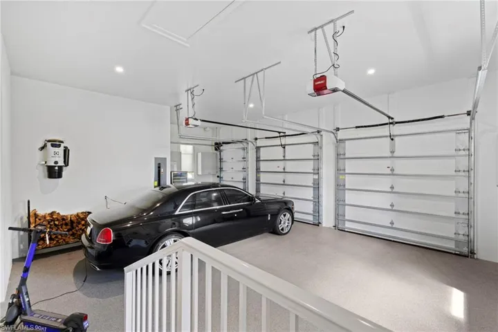Garage featuring driveway
