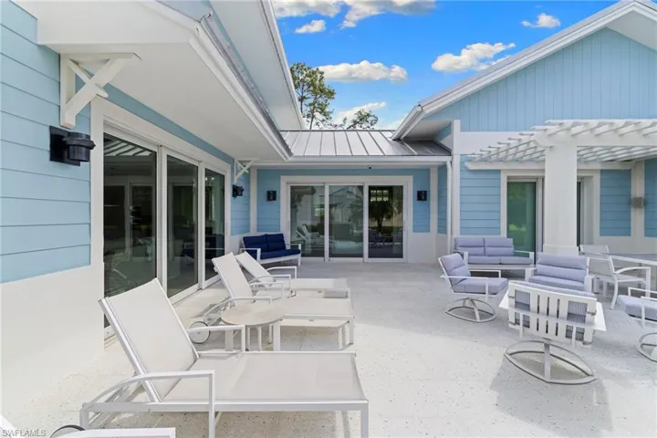 View of patio / terrace featuring outdoor dining area, a pergola, and grilling area