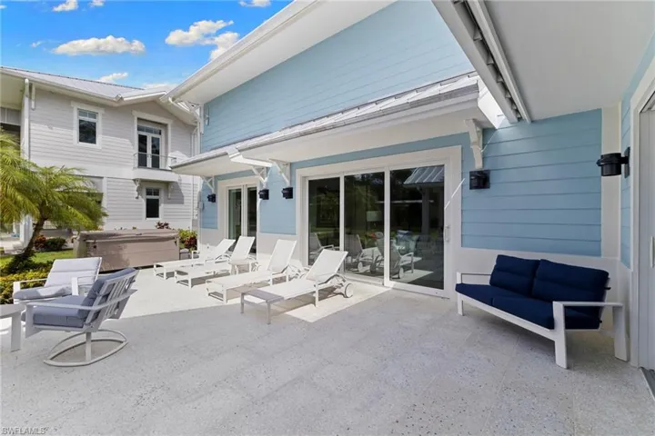 View of patio / terrace featuring an outdoor kitchen, a pergola, and outdoor dining space