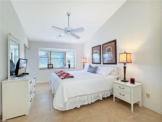 master bedroom with slider to the sunroom