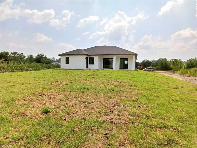 814  5th  AVE, Lehigh Acres, FL 33972