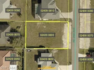 Aerial map of property and surrounding area featuring property boundaries highlighted