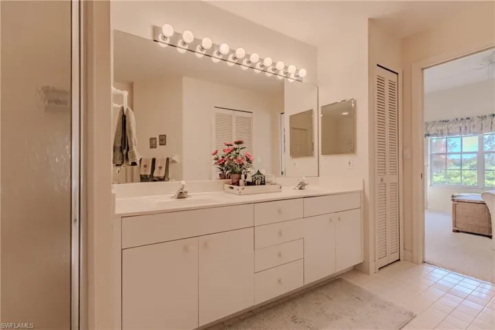 Bathroom featuring vanity and tile patterned floors