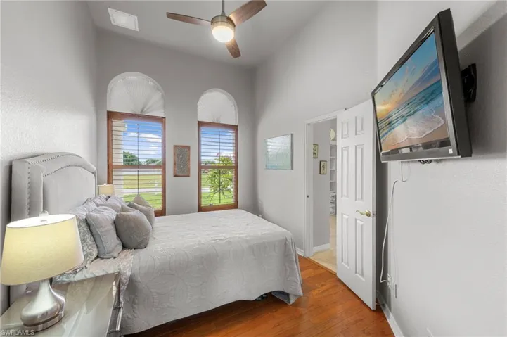 Bedroom featuring light wood-style flooring and a ceiling fan