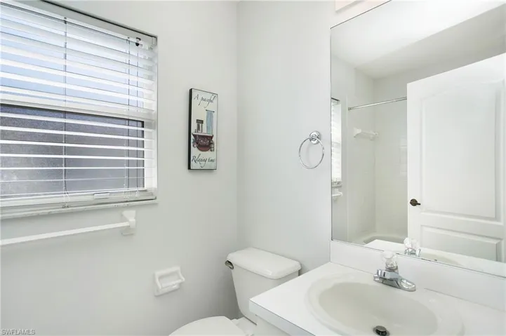 Full bathroom featuring vanity and toilet