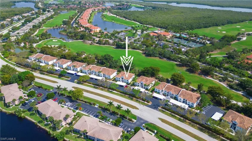 View of property location with a large body of water and nearby suburban area