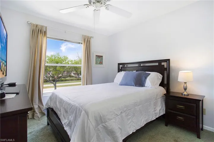 Bedroom with carpet floors and ceiling fan