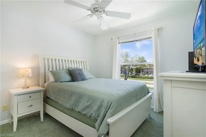 Bedroom featuring carpet floors and a ceiling fan