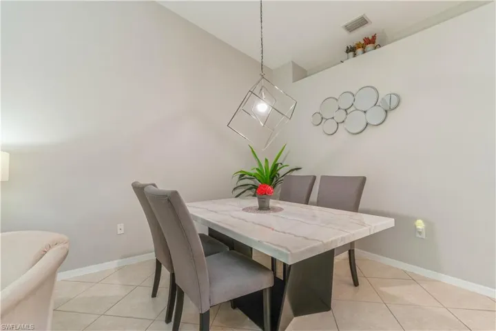 Dining room featuring light tile flooring