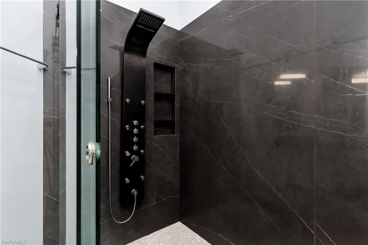 Bathroom with a tile shower