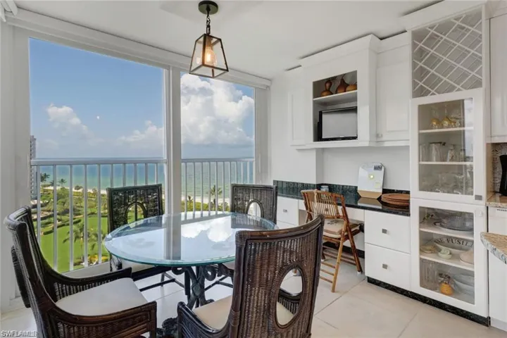 Sunroom featuring built in desk