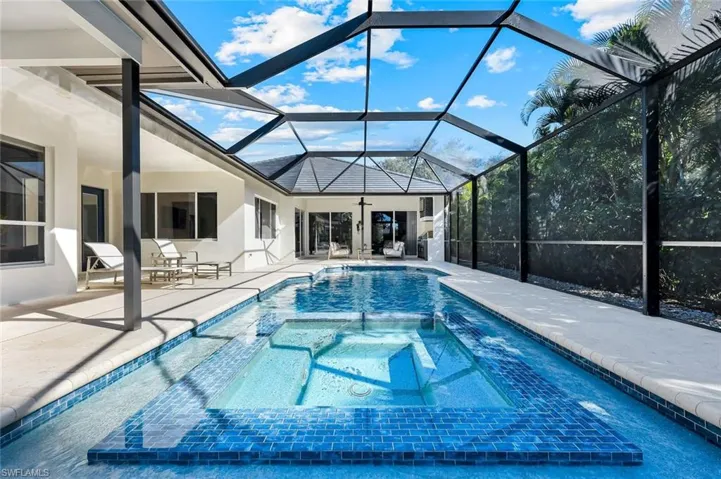 View of pool, Lanai & Rear of House