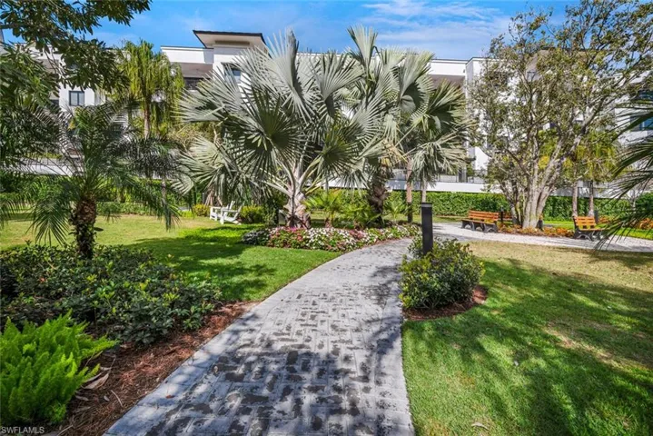 View of community with a yard