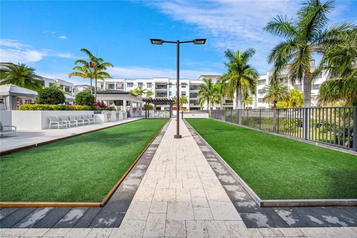 Surrounding community featuring a pergola