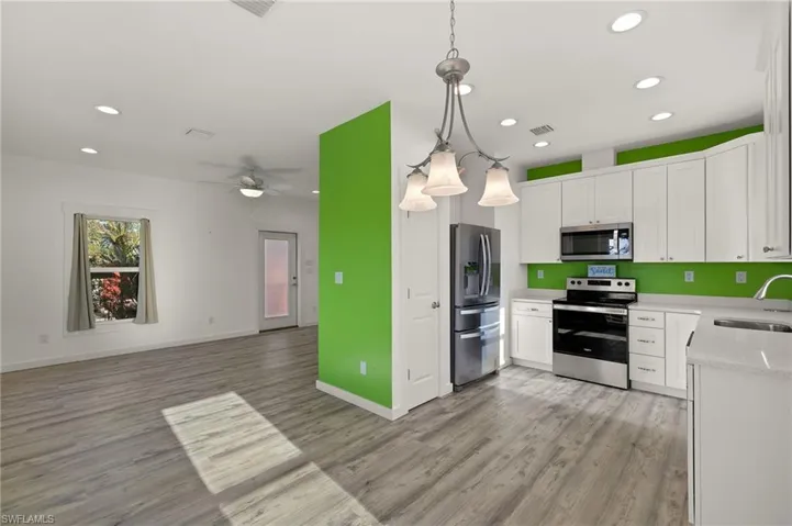 Living room, dining and kitchen