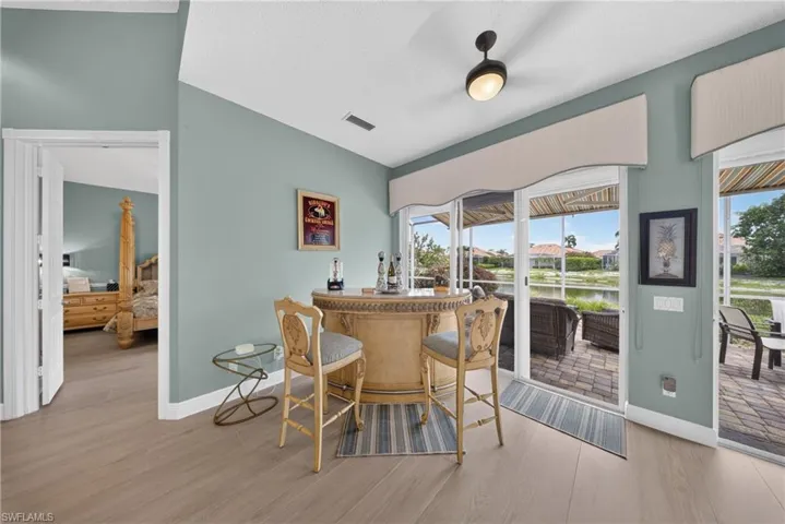 Light wood-finish flooring extending from the entryway