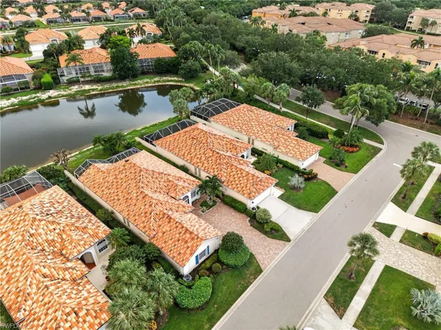 Aerial perspective showcasing a residential community with terracotta tile roofs