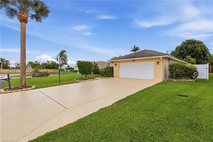 Extra-wide Driveway offers Additional Parking.
