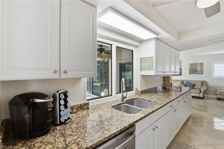 Functional Granite Countertop & Lots of Cabintry Storage in Kitchen.