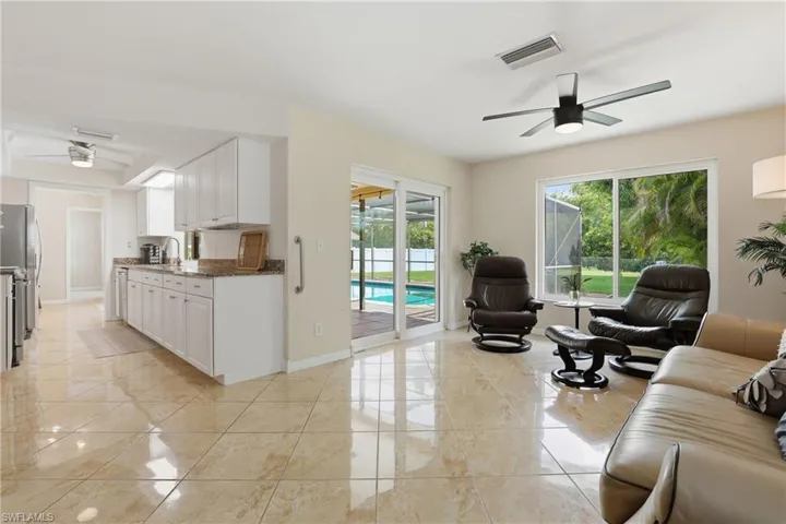 Kitchen/Family Room.View of Impact Slider which opens to Lanai & Pool.