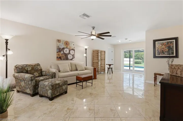Living/Dining Area/ Rear Lanai. View from Entrance.