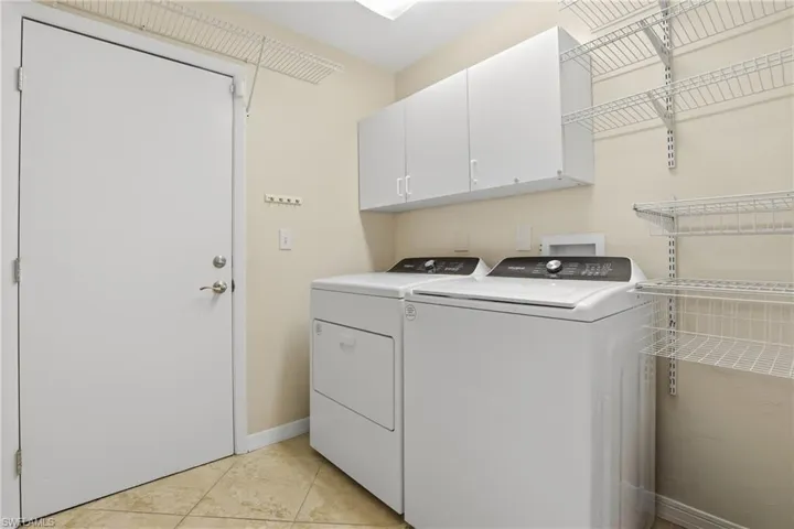 Large Utility/Laundry Room -  Next to Garage.