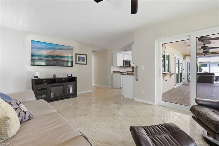 Family Room/Kitchen View.  Hallway to 2 Bedrooms/2nd Bath/Garage.