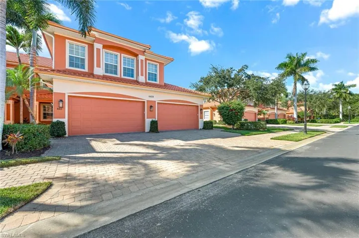 Mediterranean / spanish-style house featuring stucco siding, decorative driveway, and a tiled roof