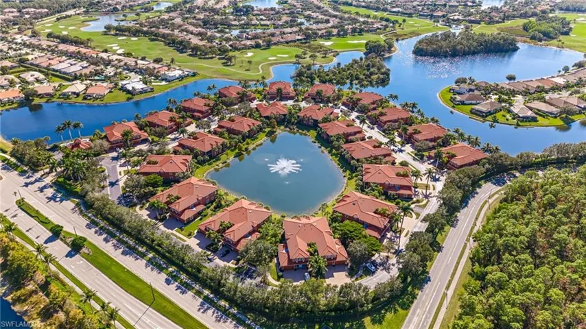 View of property location featuring nearby suburban area and a large body of water