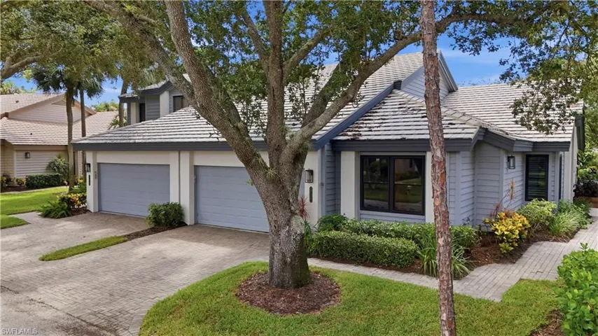 Welcome HOME to this charming residence in Burning Tree at Bonita Bay!
