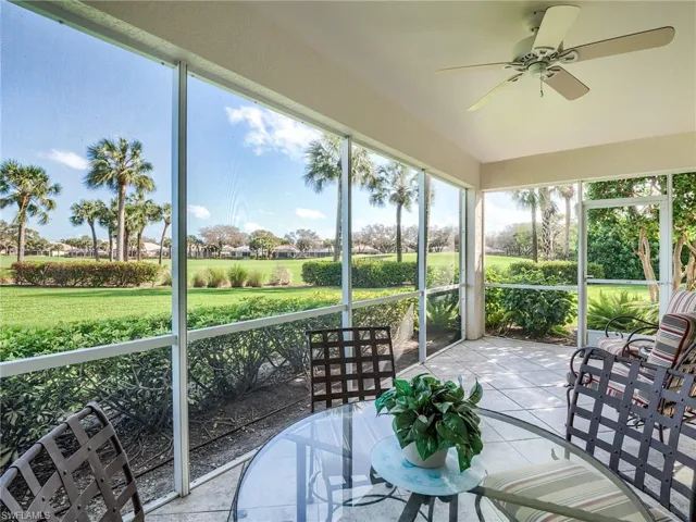 Sunroom / solarium featuring ceiling fan
