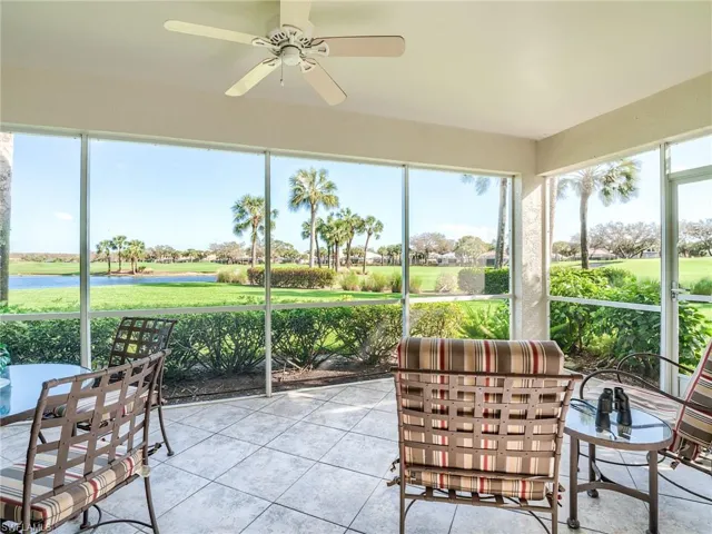 Sunroom / solarium featuring ceiling fan
