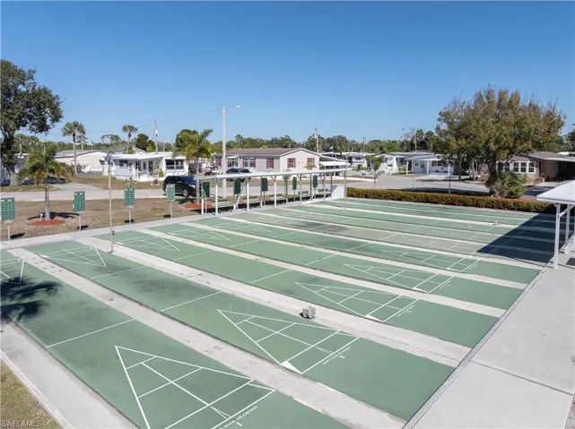 View of community with shuffleboard and a residential view