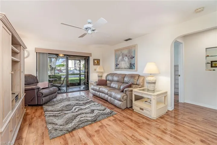 Living room featuring light wood-style flooring