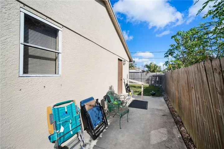 View of property exterior with a patio