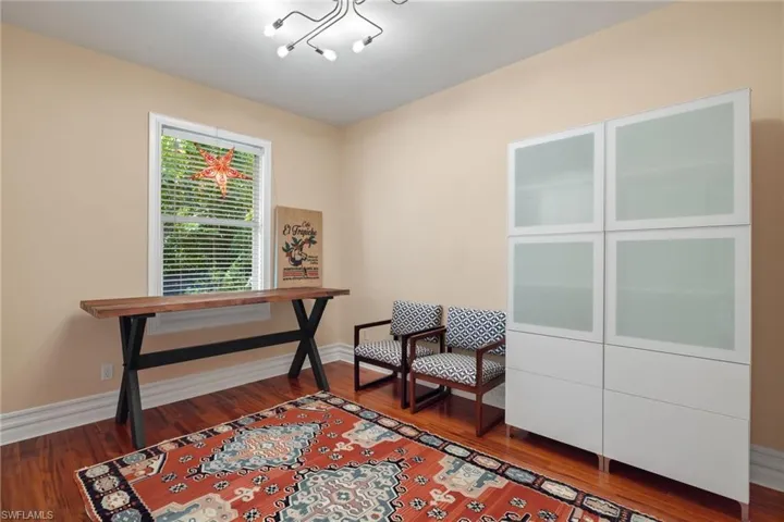 Living area featuring hardwood / wood-style floors