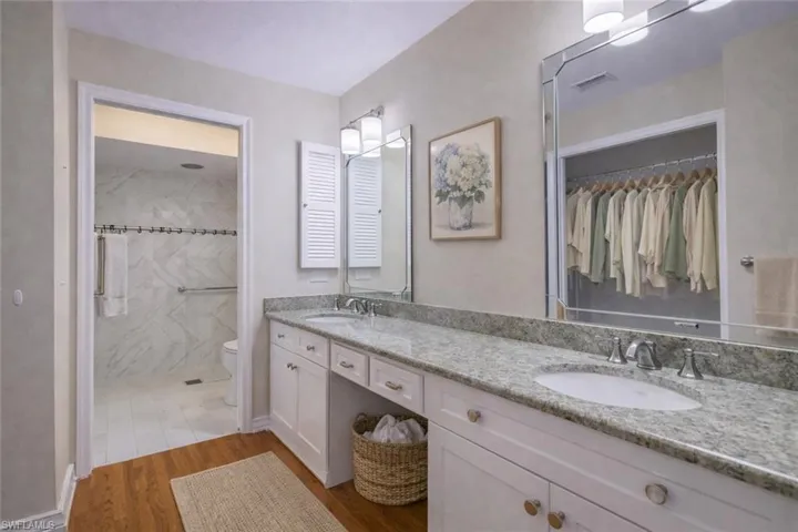 Primary Ensuite with walk in closet staged
