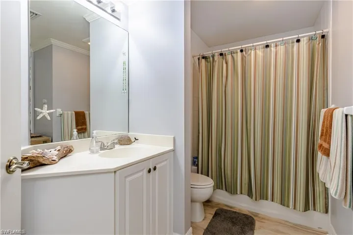 Guest bathroom on right of entry