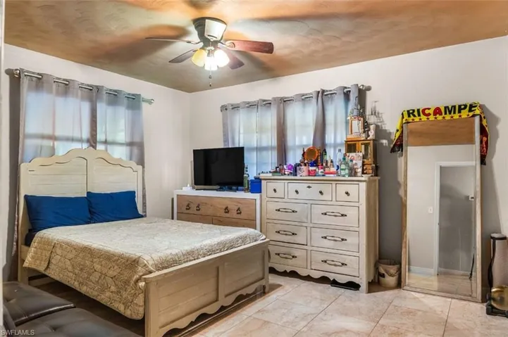 Bedroom featuring ceiling fan