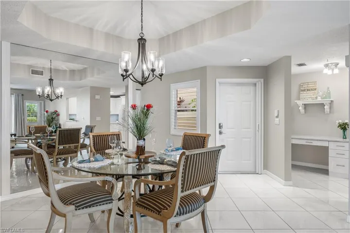 Family Dining Area & Front Entry & Built-Work Station Adjacent to Kitchen