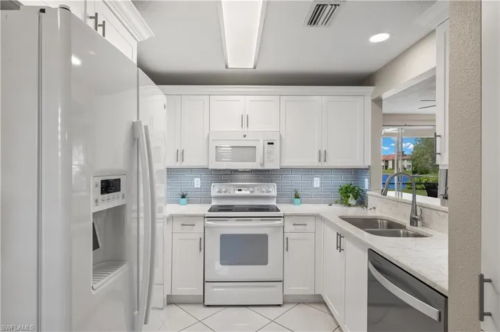 Updated Cabinets, Backsplash, and New Dishwasher
