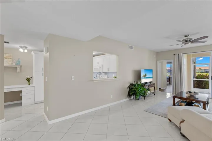 Living Room with Open Pass Through from Kitchen