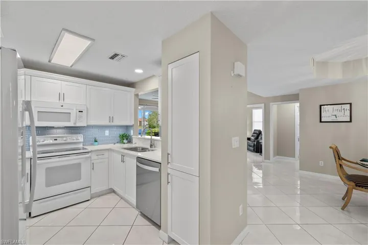 Light Bright Kitchen with Open Pass Through and Lake Views