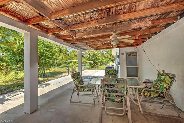 View of patio with ceiling fan