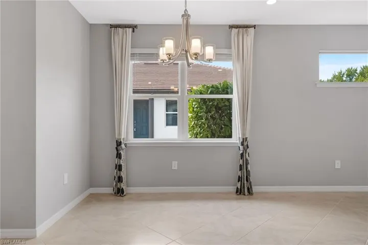An inviting dining space with an easy flow to the main living area and kitchen.