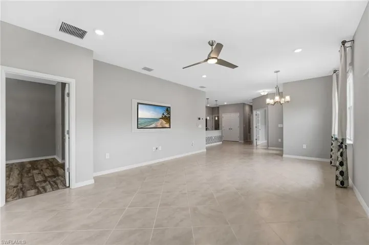 Luxury vinyl and tile flooring create a clean, cohesive look throughout the home.