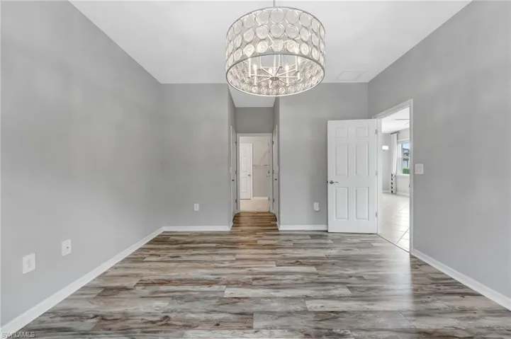 The primary suite is designed for comfort with two custom closets and a private en-suite bath.