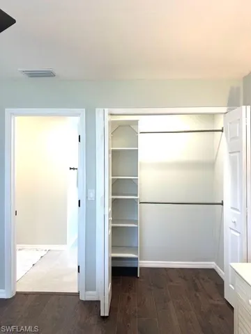 Master closet with built in shelves