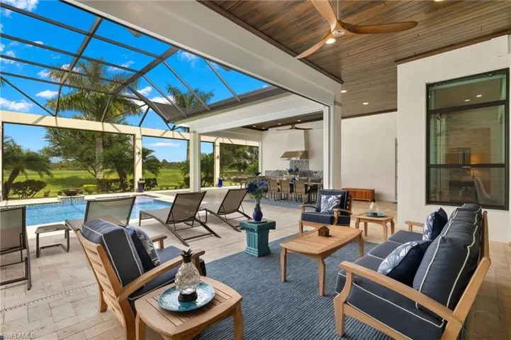 View of patio / terrace featuring enclosure, outdoor lounge area, and ceiling fan