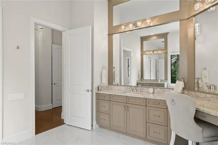Bathroom with vanity and ceramic flooring